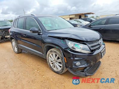 Czwarte zdjęcie samochodu z boku: 2013 VOLKSWAGEN TIGUAN S VIN:WVGAV7AX2DW528177 - miniatura