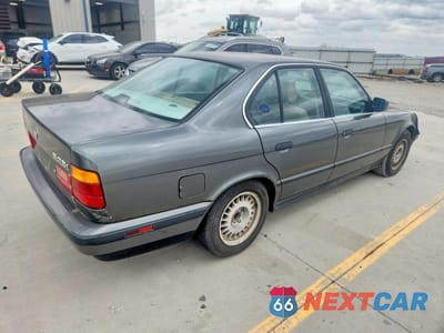 Trzecie zdjęcie samochodu z tyłu: 1989 BMW 525 I AUTOMATIC VIN:WBAHC2308KBE21554 - miniatura