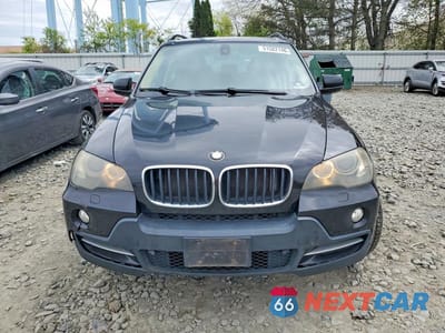 Piąte zdjęcie samochodu w środku: 2009 BMW M5 VIN:5UXFE43569L267647 - miniatura