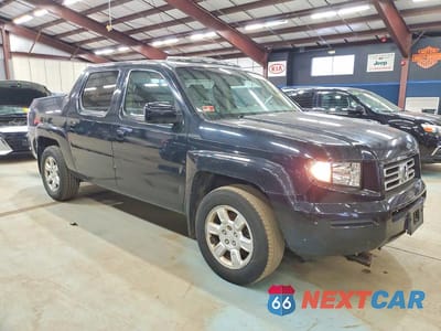Czwarte zdjęcie samochodu z boku: 2006 HONDA RIDGELINE RTL VIN:2HJYK16536H549018 - miniatura