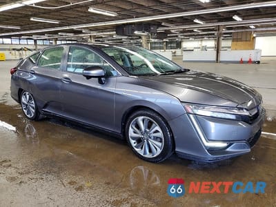 Czwarte zdjęcie samochodu z boku: 2019 HONDA CLARITY VIN:JHMZC5F15KC002001 - miniatura