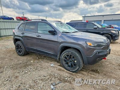 Czwarte zdjęcie samochodu z boku: 2022 JEEP CHEROKEE TRAILHAWK VIN:1C4PJMBX4ND540092 - miniatura