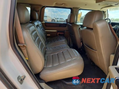 Zdjęcie 10 z 12 samochodu: 2003 HUMMER H2 VIN:5GRGN23U43H130412 - miniatura
