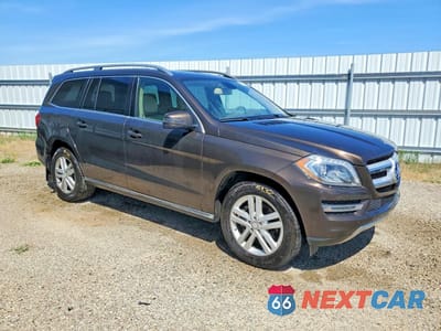 Czwarte zdjęcie samochodu z boku: 2013 MERCEDES-BENZ GL 350 BLUETEC VIN:4JGDF2EE4DA239076 - miniatura