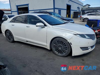 Czwarte zdjęcie samochodu z boku: 2015 LINCOLN MKZ HYBRID VIN:3LN6L2LU6FR625874 - miniatura