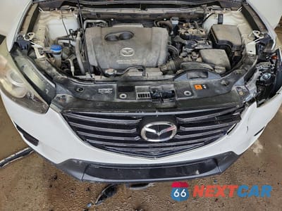 Zdjęcie 12 z 13 samochodu: 2016 MAZDA CX-5 SPORT VIN:JM3KE4BYXG0730343 - miniatura