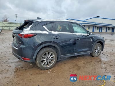 Trzecie zdjęcie samochodu z tyłu: 2021 MAZDA CX-5 GRAND TOURING VIN:JM3KFBDM8M1419138 - miniatura