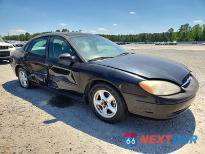 Czwarte zdjęcie samochodu z boku: 2003 FORD TAURUS VIN:1FAFP53U03A210863 - miniatura