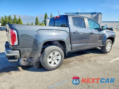 Trzecie zdjęcie samochodu z tyłu: 2016 GMC CANYON SLE VIN:1GTG5CE36G1390322 - miniatura