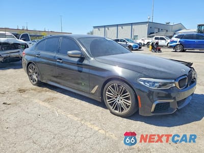 Czwarte zdjęcie samochodu z boku: 2018 BMW M550XI VIN:WBAJB9C53JB035595 - miniatura