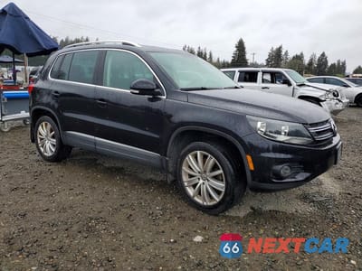 Czwarte zdjęcie samochodu z boku: 2015 VOLKSWAGEN TIGUAN S VIN:WVGBV7AX5FW580202 - miniatura