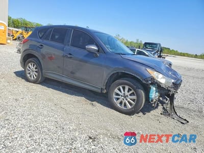 Czwarte zdjęcie samochodu z boku: 2015 MAZDA CX-5 TOURING VIN:JM3KE4CY4F0478036 - miniatura