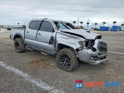 Czwarte zdjęcie samochodu z boku: 2020 TOYOTA TACOMA TRD SPORT VIN:3TMAZ5CN1LM122205 - miniatura