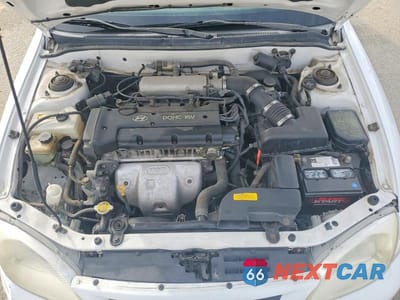 Zdjęcie 12 z 13 samochodu: 2000 HYUNDAI ELANTRA GLS VIN:KMHJW35F8YU161844 - miniatura