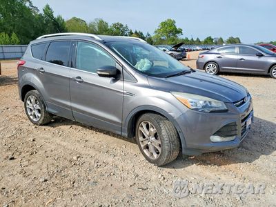 Czwarte zdjęcie samochodu z boku: 2014 FORD ESCAPE TITANIUM VIN:1FMCU0JX1EUC11023 - miniatura