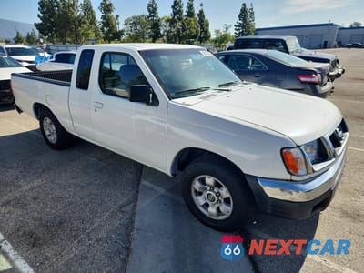Czwarte zdjęcie samochodu z boku: 1999 NISSAN FRONTIER XE VIN:1N6DD26S8XC323177 - miniatura