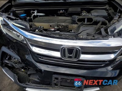 Zdjęcie 12 z 13 samochodu: 2019 HONDA PILOT TOURING VIN:5FNYF6H60KB012523 - miniatura