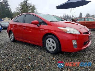 Czwarte zdjęcie samochodu z boku: 2011 TOYOTA PRIUS FOUR VIN:JTDKN3DU0B5319185 - miniatura