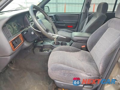 Zdjęcie 7 z 14 samochodu: 1997 JEEP GRAND CHEROKEE LAREDO VIN:1J4GZ58S7VC564865 - miniatura
