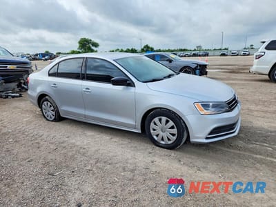 Czwarte zdjęcie samochodu z boku: 2015 VOLKSWAGEN JETTA BASE VIN:3VW2K7AJ7FM413197 - miniatura