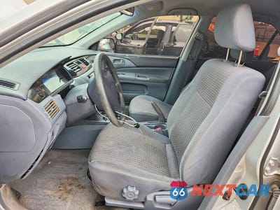 Zdjęcie 7 z 12 samochodu: 2002 MITSUBISHI LANCER ES VIN:JA3AJ26E02U016905 - miniatura