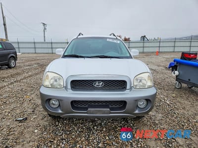Piąte zdjęcie samochodu w środku: 2002 HYUNDAI SANTA FE GLS VIN:KM8SC13D82U287535 - miniatura
