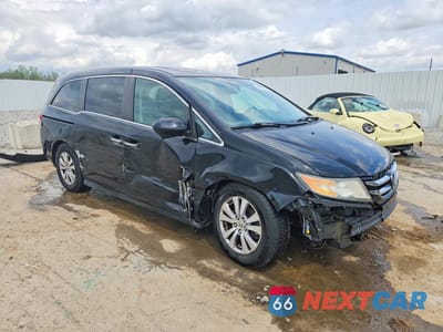 Czwarte zdjęcie samochodu z boku: 2014 HONDA ODYSSEY EXL VIN:5FNRL5H63EB063669 - miniatura