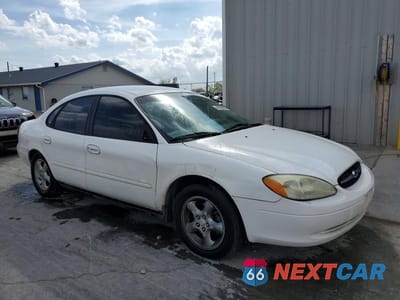 Czwarte zdjęcie samochodu z boku: 2001 FORD TAURUS SES VIN:1FAFP55U81A284834 - miniatura