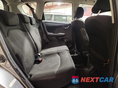 Zdjęcie 10 z 13 samochodu: 2009 HONDA FIT SPORT VIN:JHMGE88489S054975 - miniatura