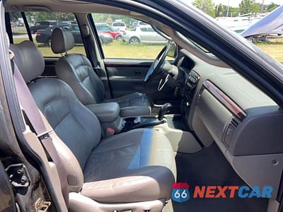 Piąte zdjęcie samochodu w środku: 2004 JEEP GRAND CHEROKEE LIMITED VIN:1J4GW58S14C372462 - miniatura