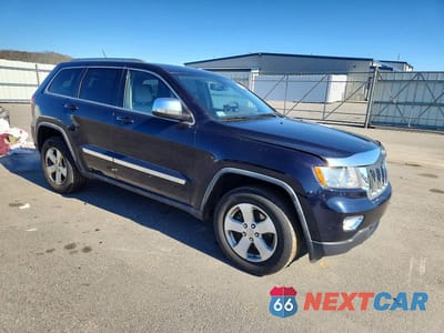 Czwarte zdjęcie samochodu z boku: 2011 JEEP GRAND CHEROKEE LAREDO VIN:1J4RR4GG8BC563302 - miniatura