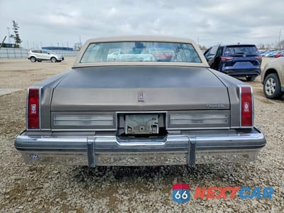 Zdjęcie 6 z 12 samochodu: 1984 OLDSMOBILE 98 REGENCY BROUGHAM VIN:1G3AH69Y3EM760125 - miniatura