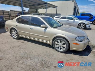 Czwarte zdjęcie samochodu z boku: 2003 NISSAN MAXIMA GXE VIN:JN1DA31A23T410487 - miniatura