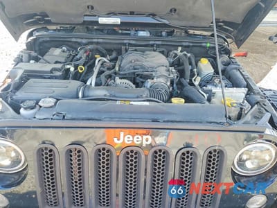 Zdjęcie 12 z 13 samochodu: 2015 JEEP WRANGLER SAHARA VIN:1C4GJWBG6FL773247 - miniatura