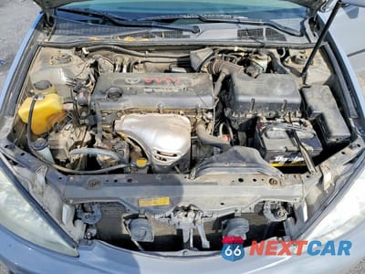 Zdjęcie 11 z 12 samochodu: 2003 TOYOTA CAMRY LE VIN:JTDBE32K730146698 - miniatura