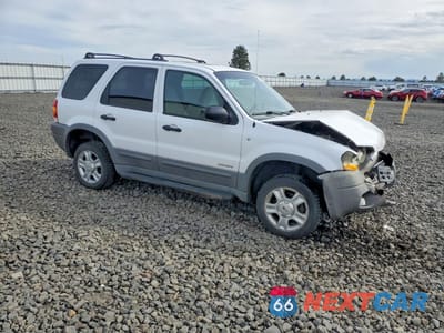 Czwarte zdjęcie samochodu z boku: 2001 FORD ESCAPE XLT VIN:1FMYU04191KA01000 - miniatura