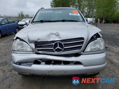 Piąte zdjęcie samochodu w środku: 2000 MERCEDES-BENZ ML 430 VIN:4JGAB72E3YA208889 - miniatura