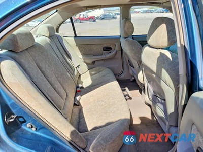 Zdjęcie 10 z 13 samochodu: 2002 HYUNDAI ELANTRA GLS VIN:KMHDN45D12U291413 - miniatura