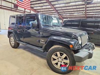 Czwarte zdjęcie samochodu z boku: 2017 JEEP WRANGLER UNLIMITED SAHARA VIN:1C4HJWEG4HL521385 - miniatura