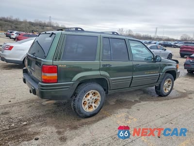 Trzecie zdjęcie samochodu z tyłu: 1997 JEEP GRAND CHEROKEE LIMITED VIN:1J4GZ78YXVC563693 - miniatura