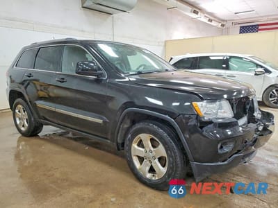 Czwarte zdjęcie samochodu z boku: 2012 JEEP GRAND CHEROKEE LAREDO VIN:1C4RJFAG2CC225574 - miniatura