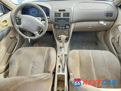 Zdjęcie 8 z 11 samochodu: 2001 TOYOTA COROLLA CE VIN:1NXBR12E51Z422767 - miniatura