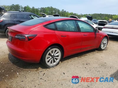 Trzecie zdjęcie samochodu z tyłu: 2023 TESLA MODEL 3 VIN:5YJ3E1EA3PF435788 - miniatura