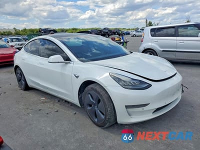 Czwarte zdjęcie samochodu z boku: 2019 TESLA MODEL 3 VIN:5YJ3E1EA7KF426584 - miniatura