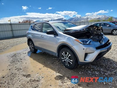 Czwarte zdjęcie samochodu z boku: 2016 TOYOTA RAV4 LE VIN:2T3BFREV6GW504154 - miniatura