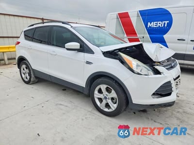 Czwarte zdjęcie samochodu z boku: 2016 FORD ESCAPE SE VIN:1FMCU0GX5GUB07029 - miniatura