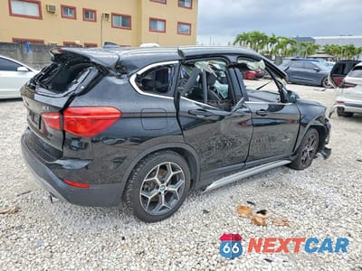 Trzecie zdjęcie samochodu z tyłu: 2017 BMW X1 XDRIVE28I VIN:WBXHT3C34H5F80598 - miniatura