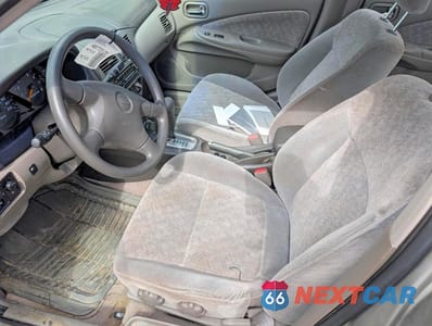 Zdjęcie 7 z 12 samochodu: 2002 NISSAN SENTRA XE VIN:3N1CB51D92L592996 - miniatura