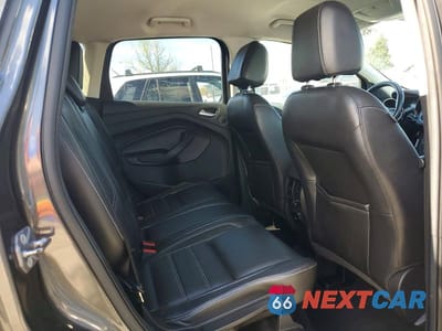 Zdjęcie 11 z 12 samochodu: 2017 FORD ESCAPE TITANIUM VIN:1FMCU9JD7HUD77500 - miniatura