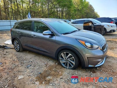 Czwarte zdjęcie samochodu z boku: 2017 KIA NIRO TOURING VIN:KNDCE3LC9H5038072 - miniatura